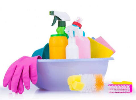 Cleaner preparing equipment for a carpet cleaning appointment
